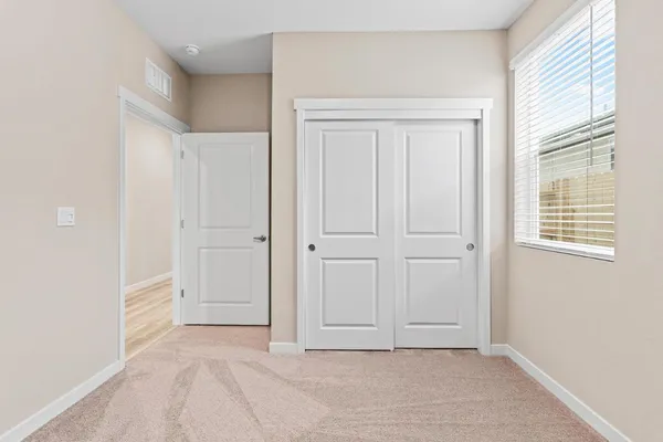 an empty room with window