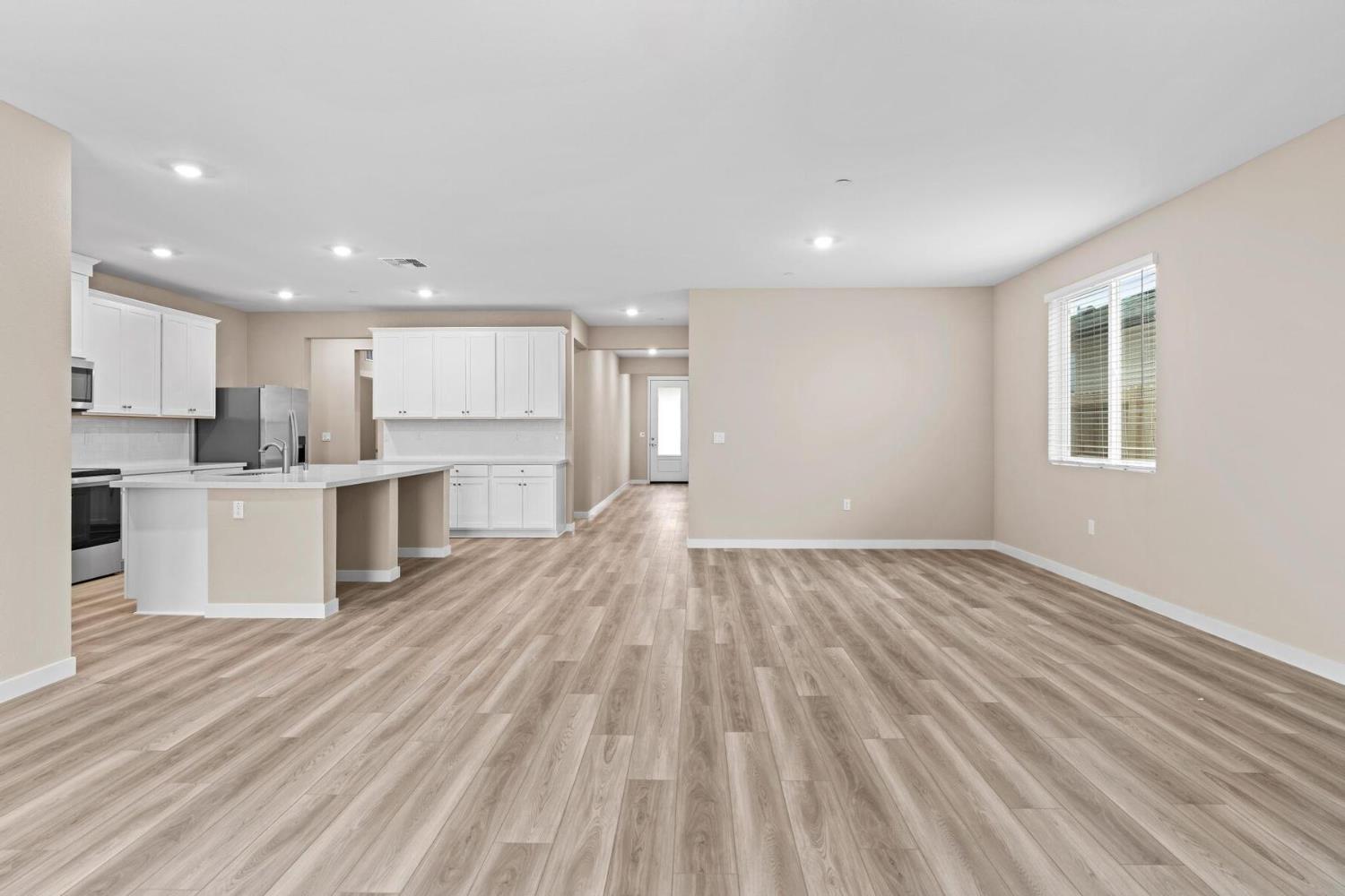 3440 Jake Way Denair, CA 95316 - Photo 7 of 18 a view of kitchen with wooden floor and electronic appliances