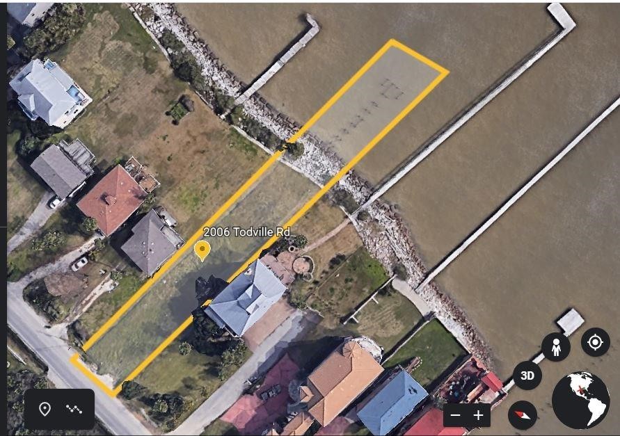 2006 Todville Road Seabrook, TX 77586 - Photo 4 of 6 an aerial view of a house with a floor to ceiling window and a rug