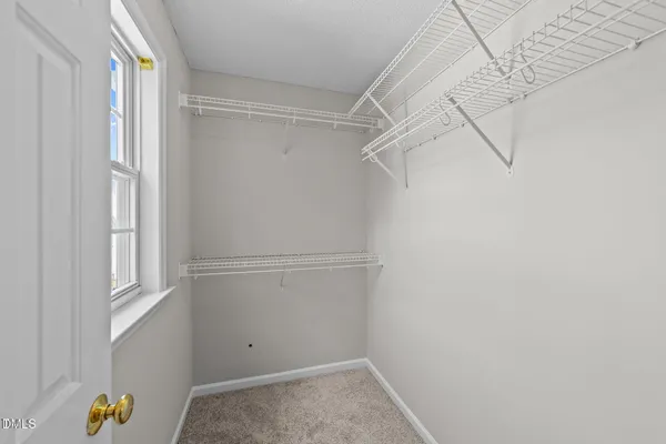 a view of a room with racks on the wall