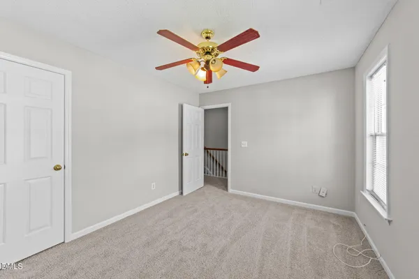 a view of an empty room with window