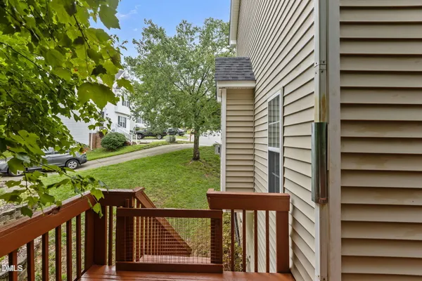 a view of a porch with a yard