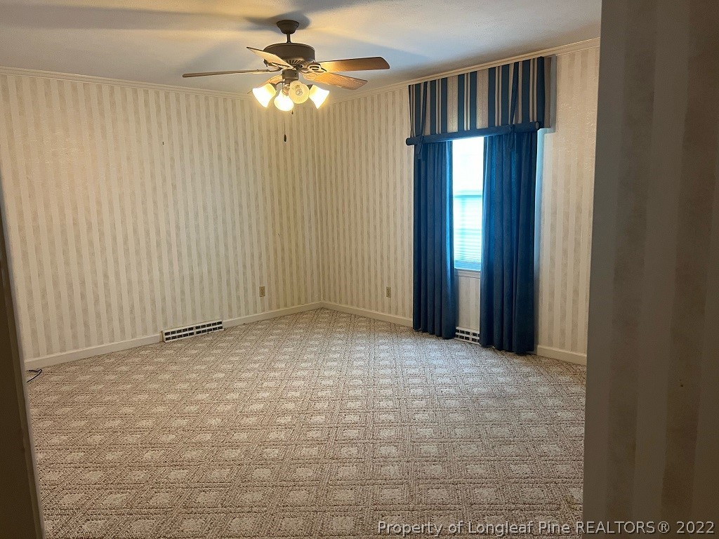 110 Bee Gee Road Lumberton, NC 28358 - Photo 14 of 42 a view of an empty room with a window