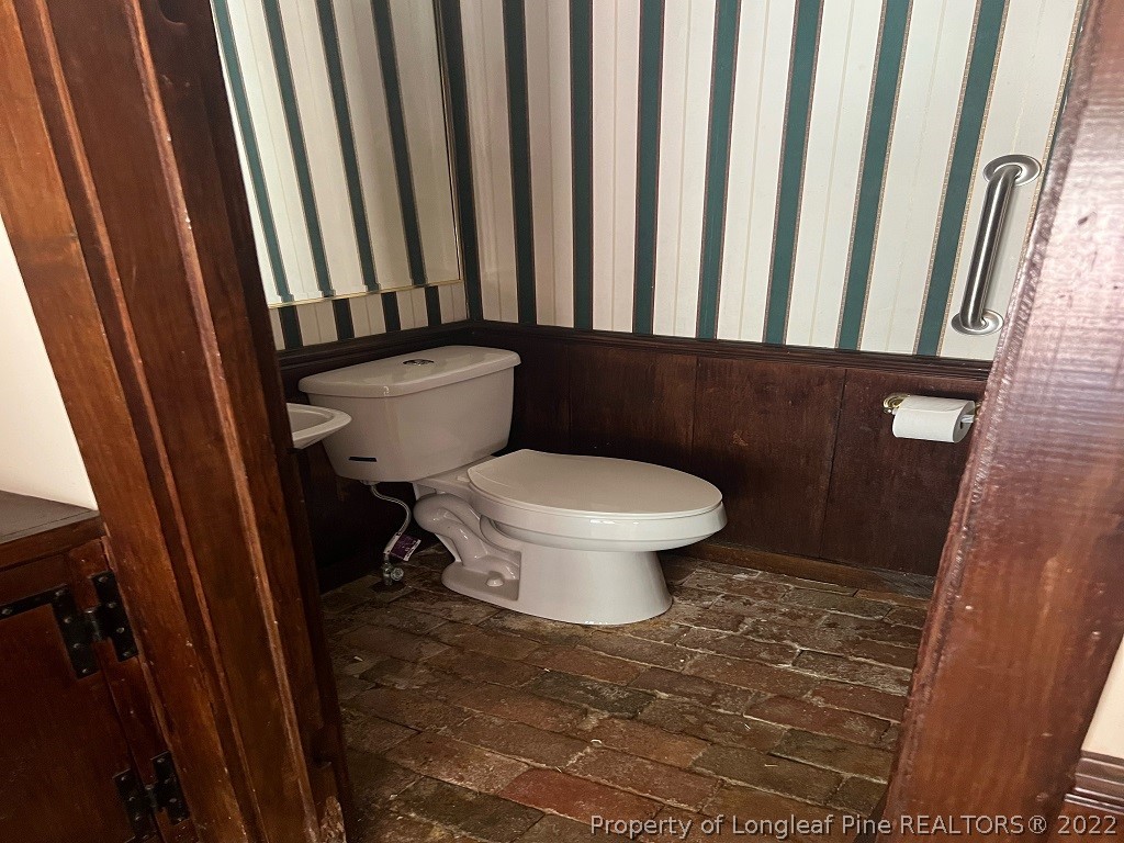 110 Bee Gee Road Lumberton, NC 28358 - Photo 31 of 42 a bathroom with a toilet and a shower