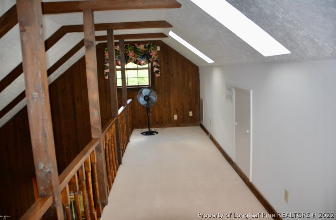 110 Bee Gee Road Lumberton, NC 28358 - Photo 38 of 42 a view of a hallway with window and stairs