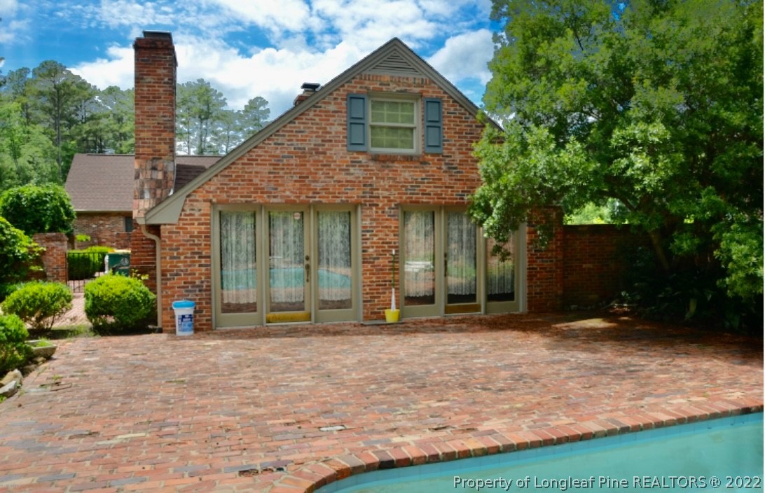 110 Bee Gee Road Lumberton, NC 28358 - Photo 4 of 42 a front view of a house with garden