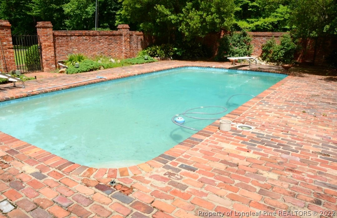 110 Bee Gee Road Lumberton, NC 28358 - Photo 5 of 42 a view of a backyard with sitting area