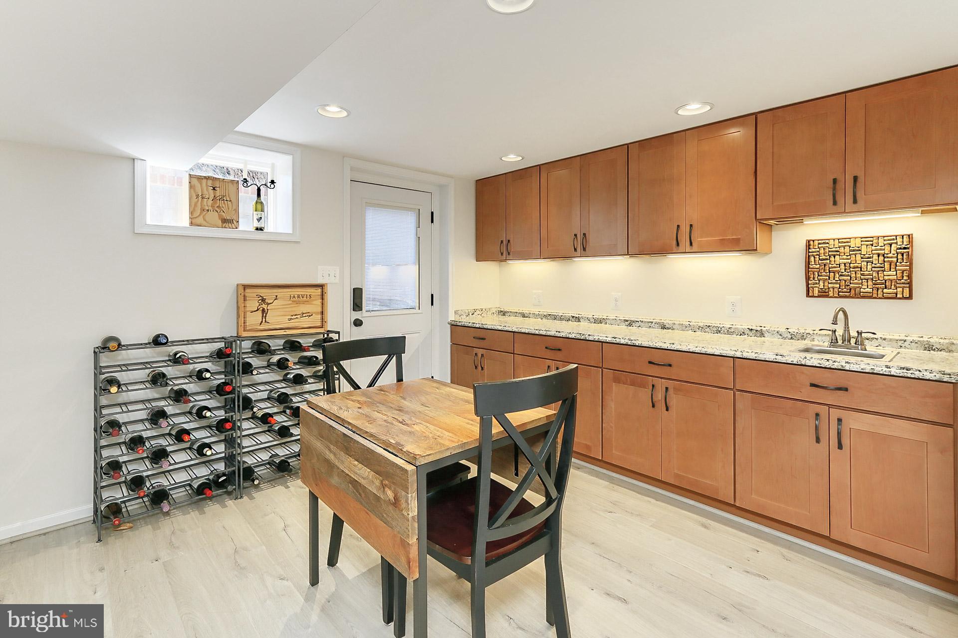 8920 Victoria Road Springfield, VA 22151 - Photo 32 of 49 Lovely cabinetry and access to the walk up stairs