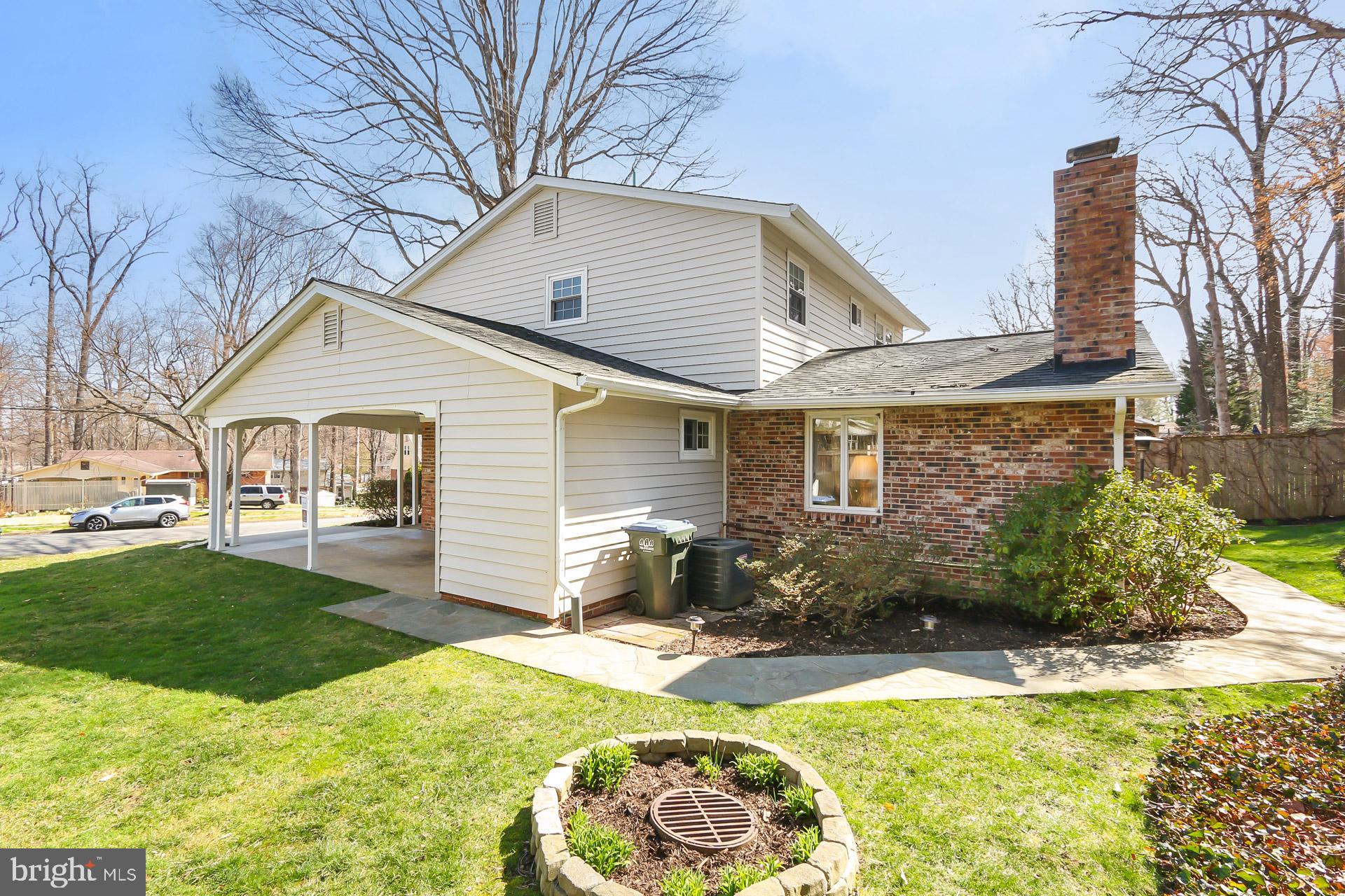 8920 Victoria Road Springfield, VA 22151 - Photo 45 of 49 Side exterior showing carport