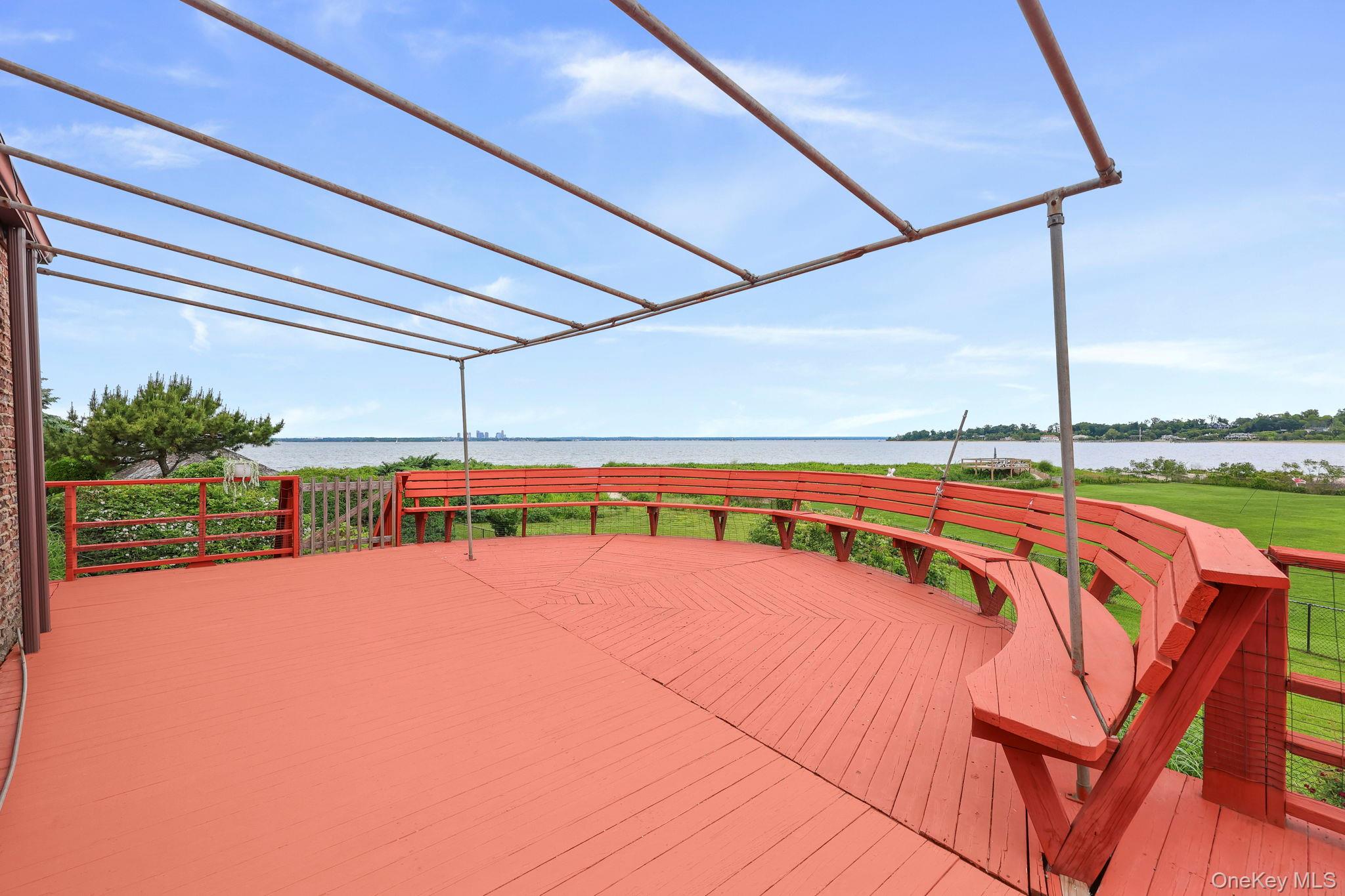 69 Cornwells Beach Road Sands Point, NY 11050 - Photo 16 of 42 a view of a backyard of a house