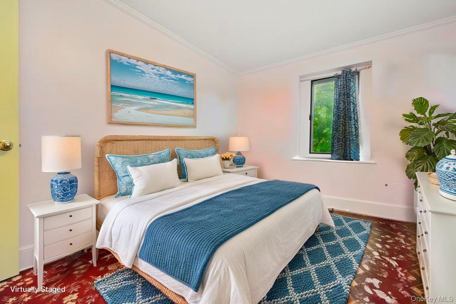 69 Cornwells Beach Road Sands Point, NY 11050 - Photo 21 of 42 a bedroom with bed and a window