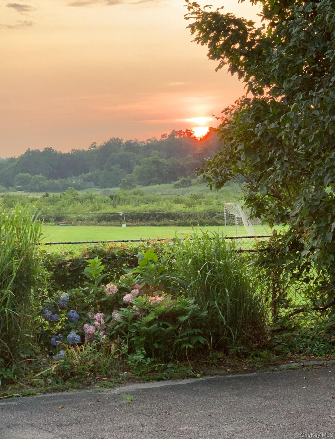 69 Cornwells Beach Road Sands Point, NY 11050 - Photo 31 of 42 a view of outdoor space and mountain view