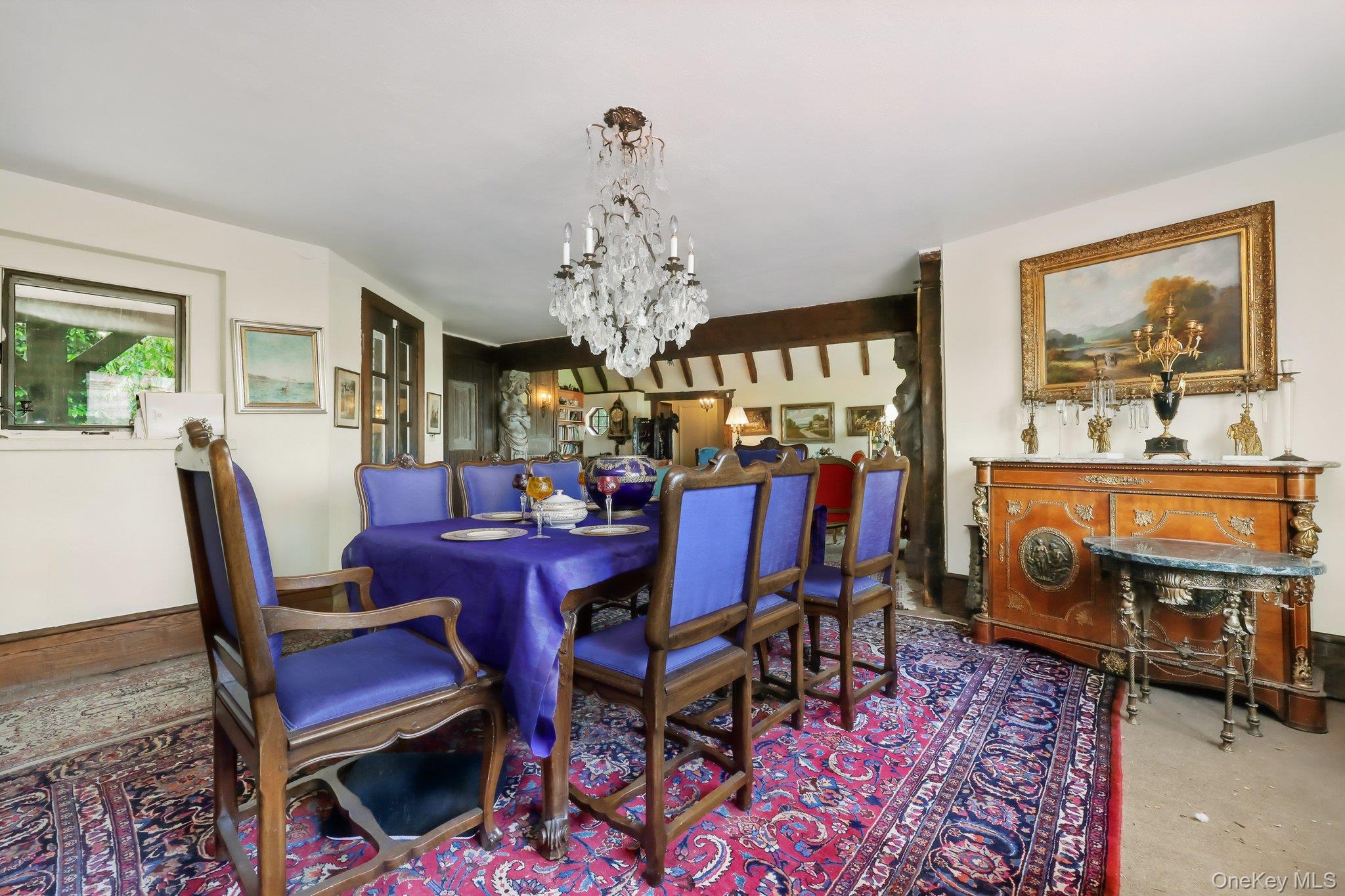 69 Cornwells Beach Road Sands Point, NY 11050 - Photo 5 of 42 a view of a dining room with furniture