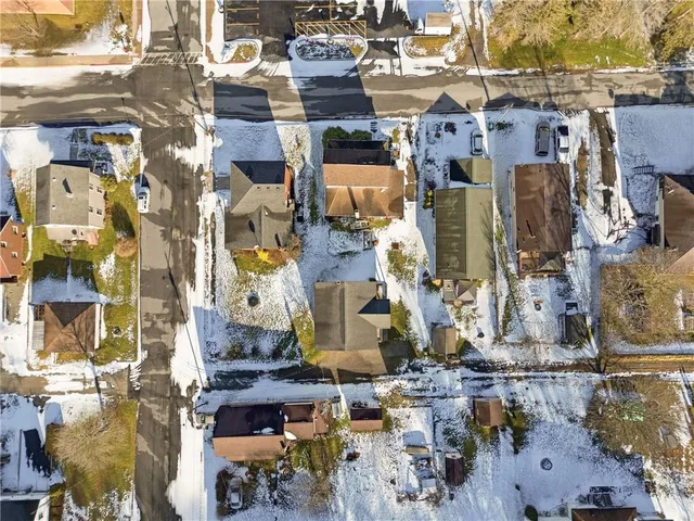 an aerial view of residential building with parking space