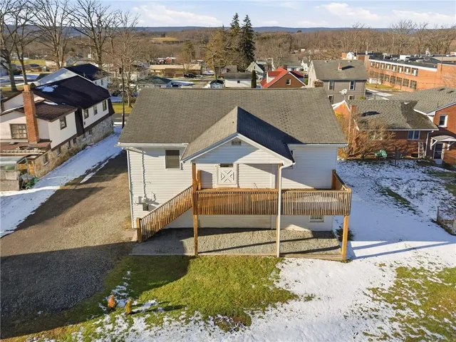 a view of a house with a ocean view
