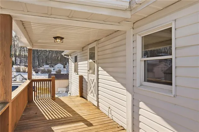 a view of a balcony with door