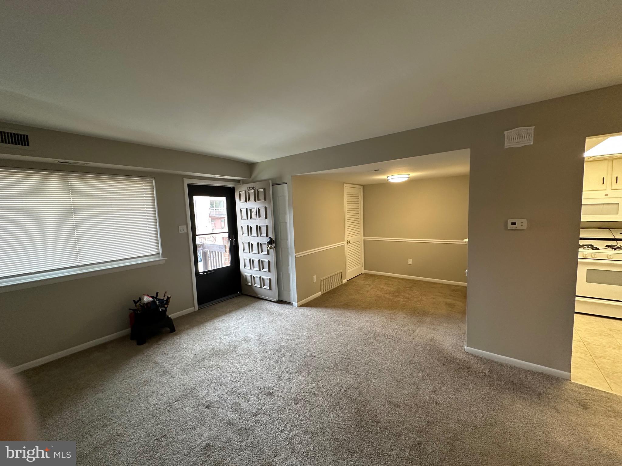 18204-00 Delaire Landing Road, Unit 204 Philadelphia, PA 19114 - Photo 3 of 14 an empty room with windows