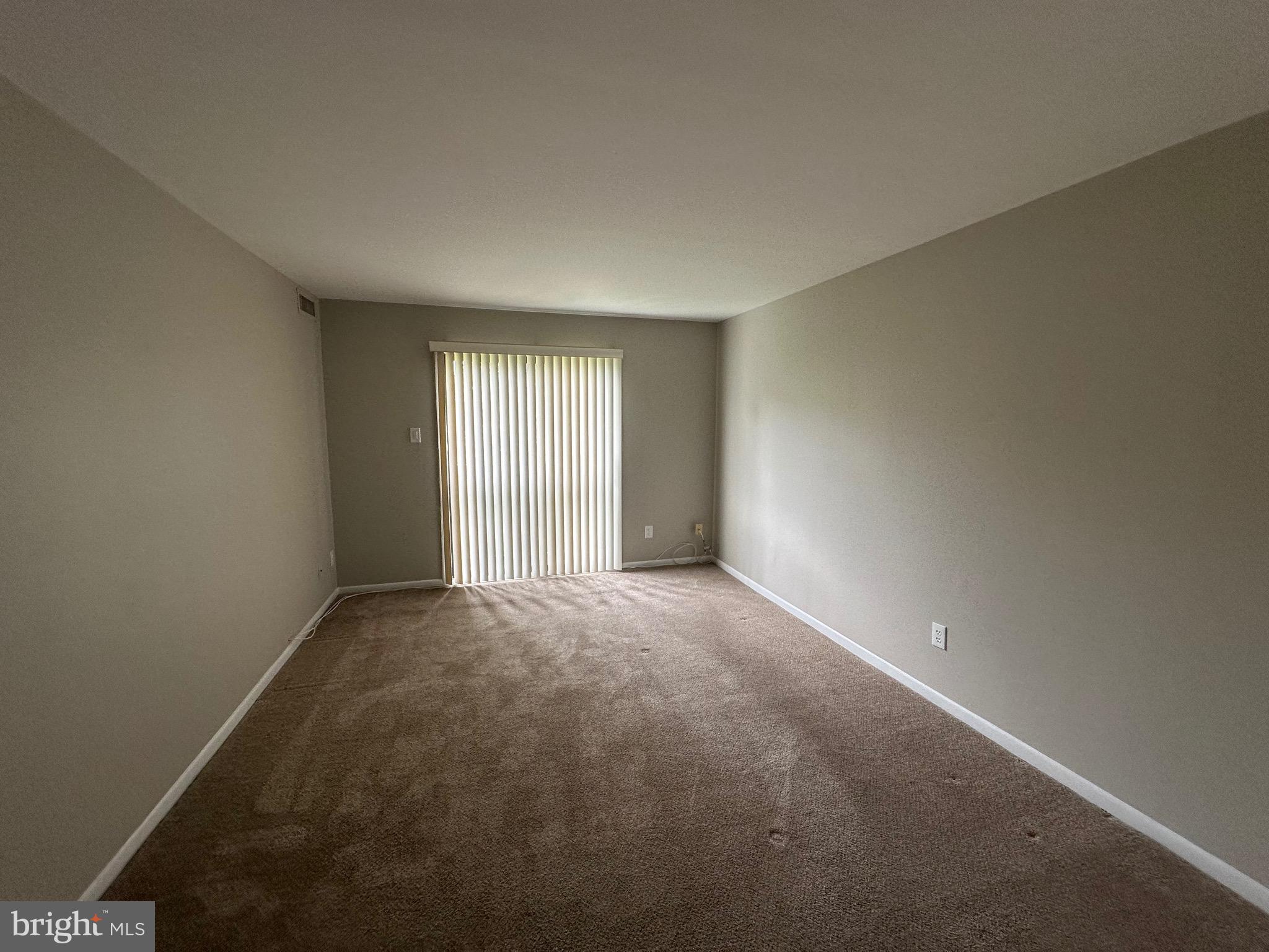 18204-00 Delaire Landing Road, Unit 204 Philadelphia, PA 19114 - Photo 6 of 14 an empty room with windows