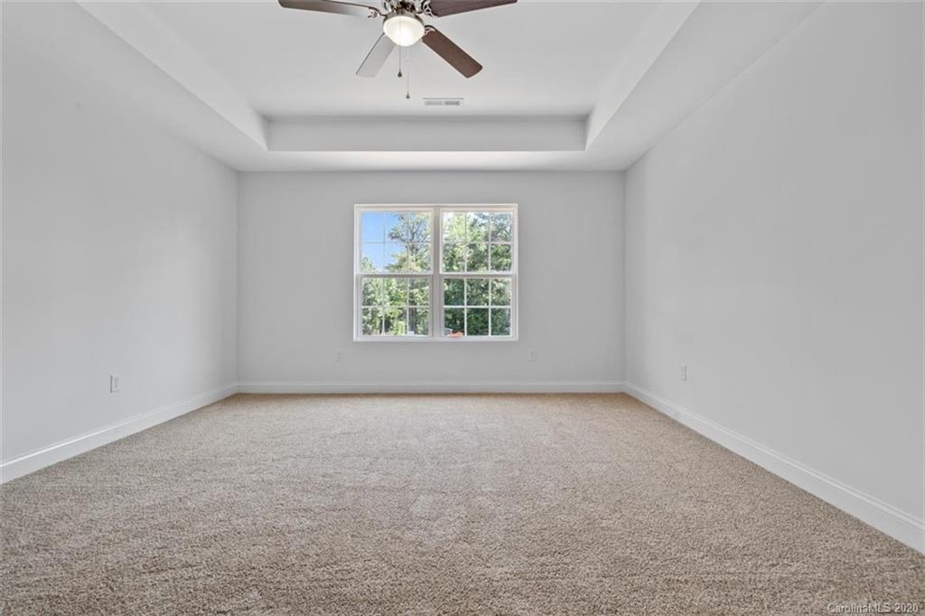 2993 Greenleaf Road, Unit 4 Clover, SC 29710 - Photo 22 of 45 an empty room with a window