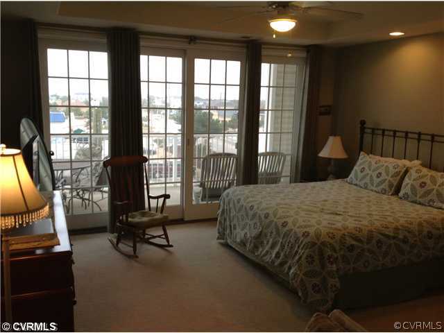 204 Sandbridge Road, Unit 206 Virginia Beach, VA 23456 - Photo 11 of 24 Master Bedroom - Master Suite leads to balcony with beautiful view of the ocean and back bay