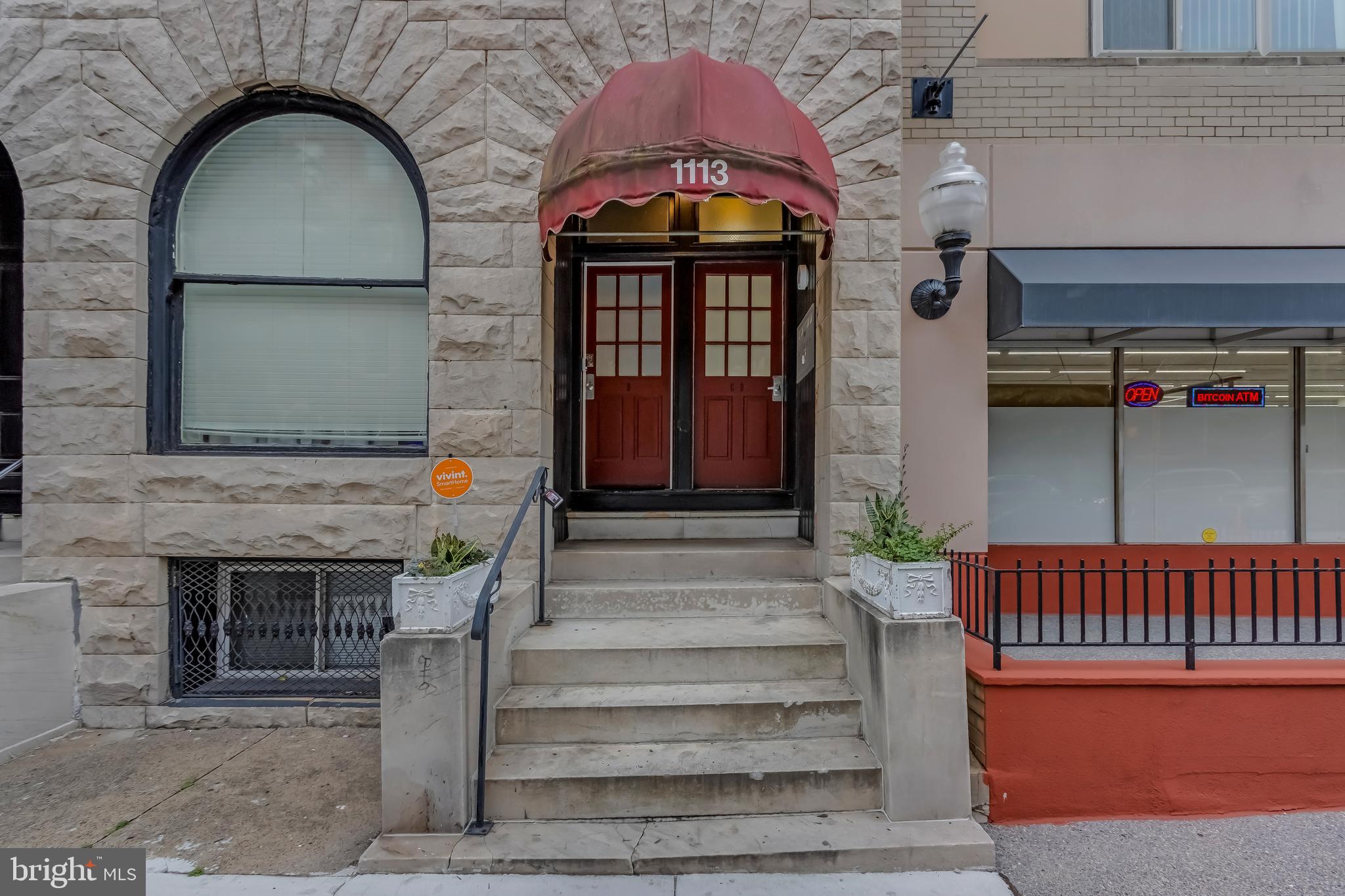 a view of entryway with a front door