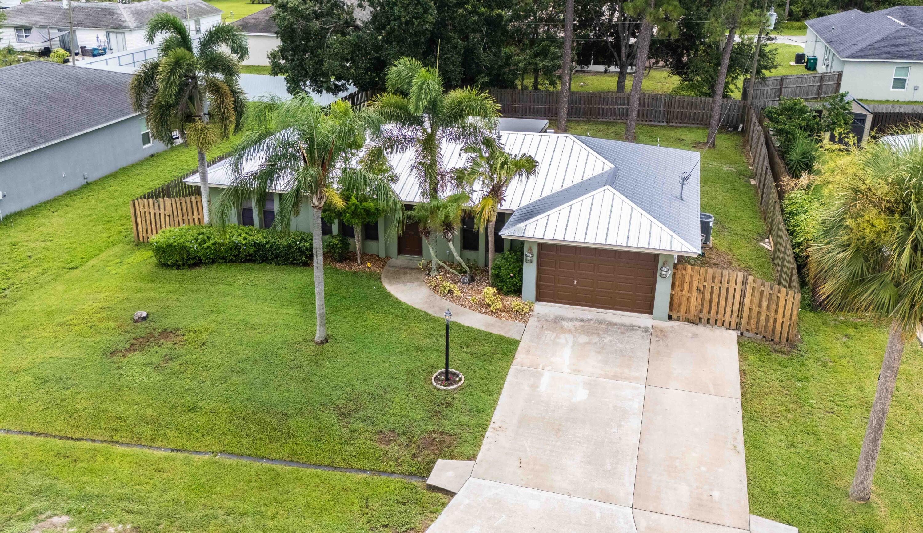 2449 Southwest Roney Road Port St. Lucie, FL 34953 - Photo 28 of 30 DJI_20250717110042_0071_D-HDR
