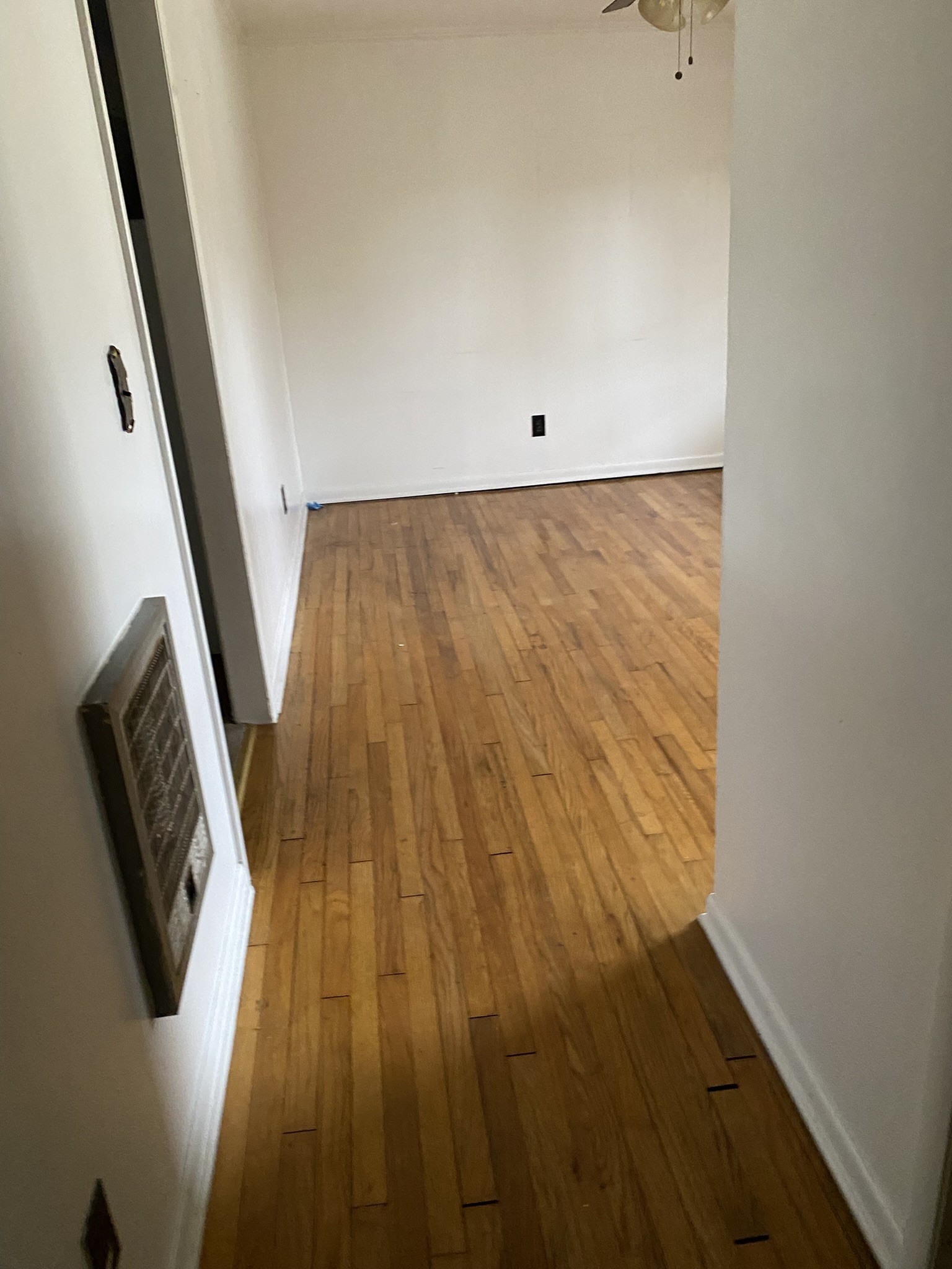 1035 North 3rd Street Pulaski, TN 38478 - Photo 14 of 14 wooden floor in an empty room with a window
