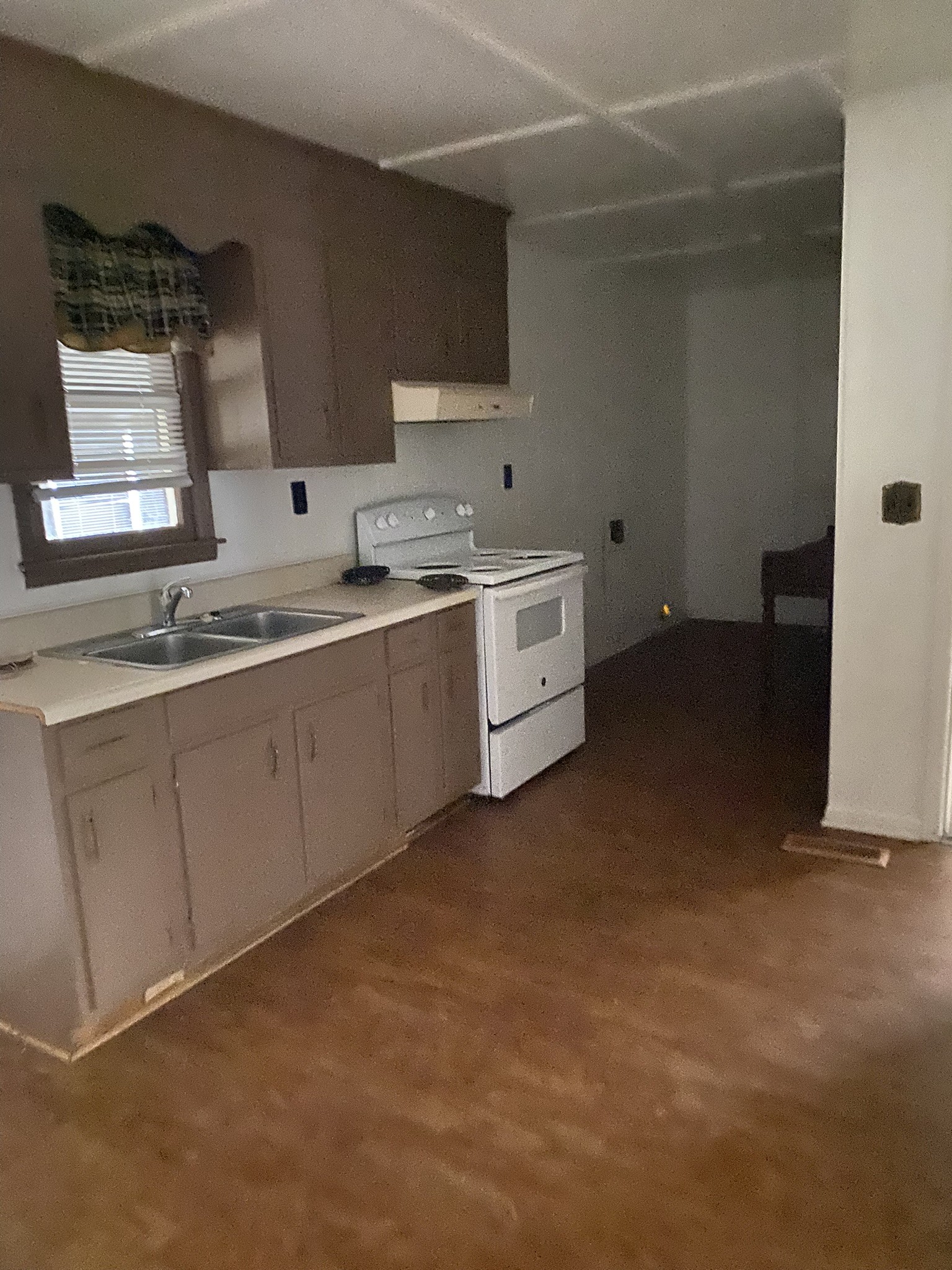 1035 North 3rd Street Pulaski, TN 38478 - Photo 10 of 14 a kitchen with sink and cabinets