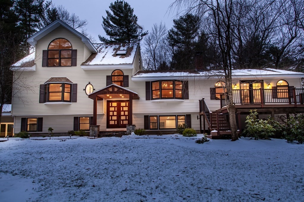 14 Pikes Hill Road Sterling, MA 01564 - Photo 3 of 40 a front view of a house with garden