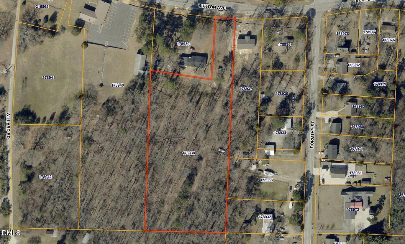 1303 Burton Avenue High Point, NC 27262 - Photo 1 of 1 an aerial view of a residential apartment building with a yard