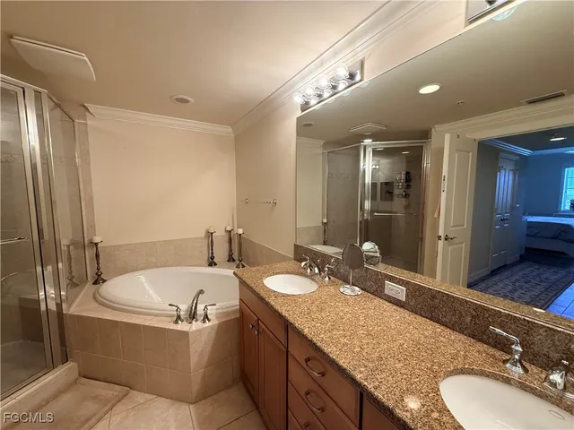 a bed room with a bed window and a desk