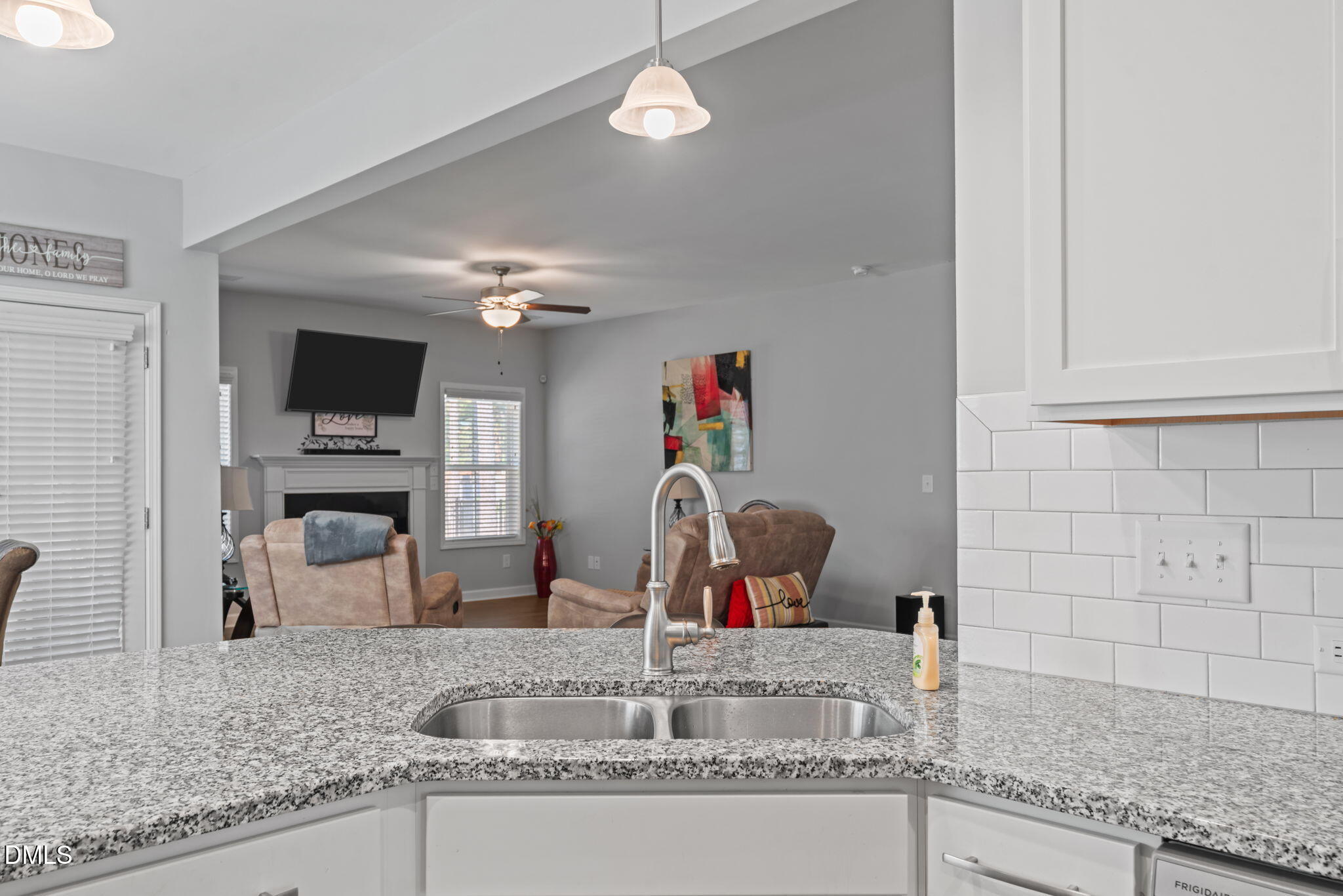 157 Timber Skip Drive Spring Lake, NC 28390 - Photo 16 of 44 a view of a kitchen counter top and living room