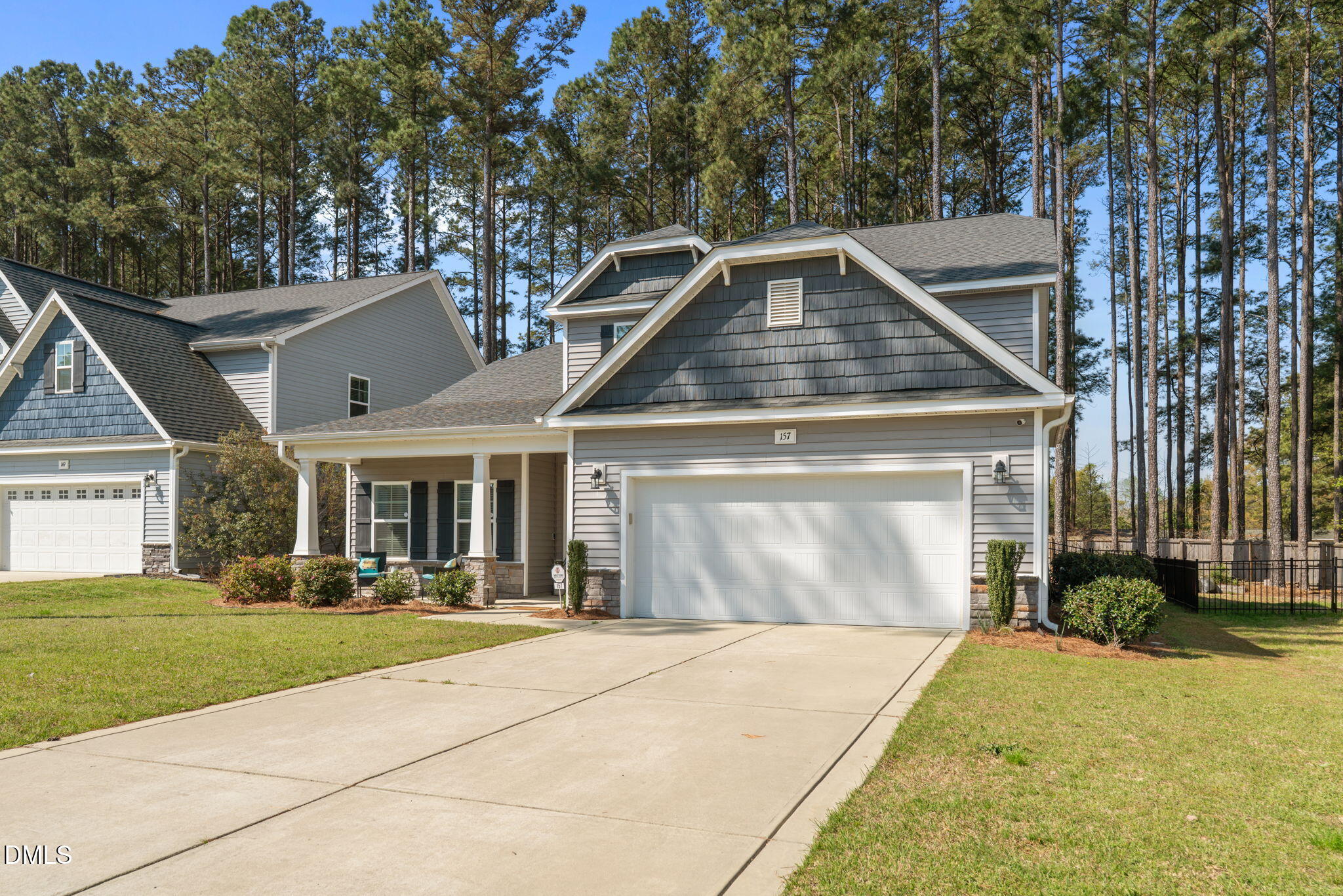 157 Timber Skip Drive Spring Lake, NC 28390 - Photo 2 of 44 a front view of a house with a yard