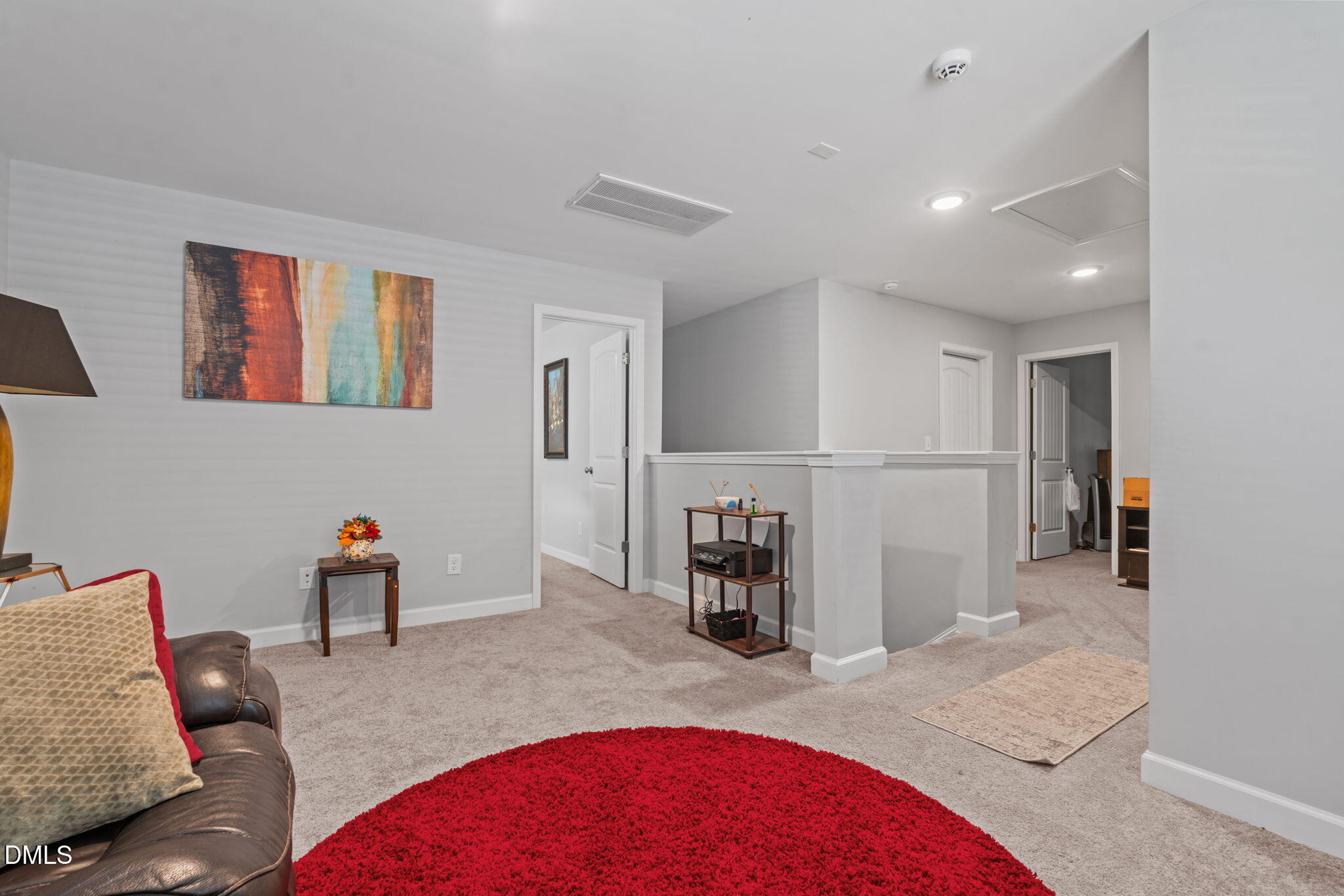 157 Timber Skip Drive Spring Lake, NC 28390 - Photo 26 of 44 a living room with furniture and a wooden floor