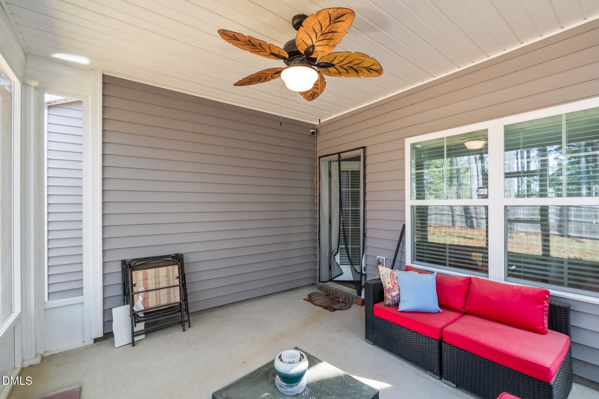 157 Timber Skip Drive Spring Lake, NC 28390 - Photo 33 of 44 a living room with furniture and a potted plant