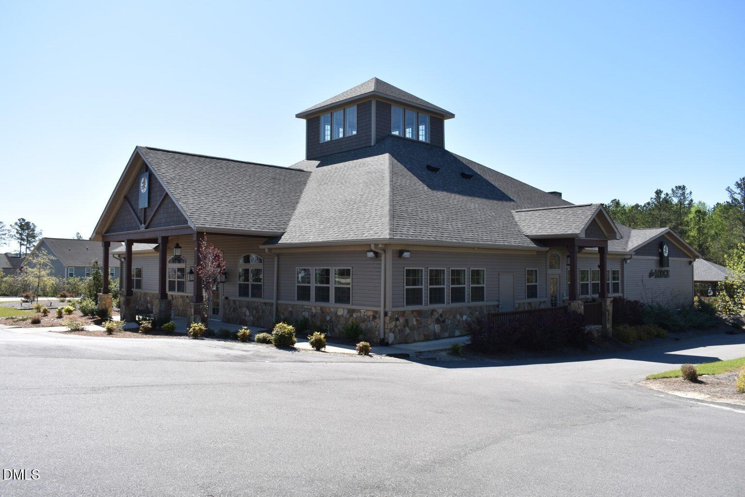 157 Timber Skip Drive Spring Lake, NC 28390 - Photo 42 of 44 a front view of a house with a yard