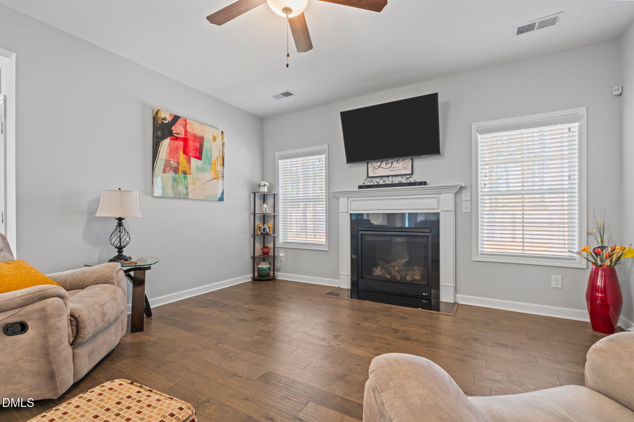 157 Timber Skip Drive Spring Lake, NC 28390 - Photo 9 of 44 a living room with furniture and a flat screen tv