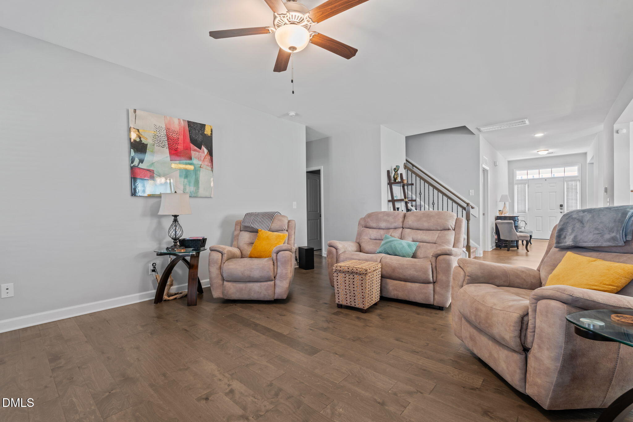 157 Timber Skip Drive Spring Lake, NC 28390 - Photo 10 of 44 a living room with furniture and a chandelier