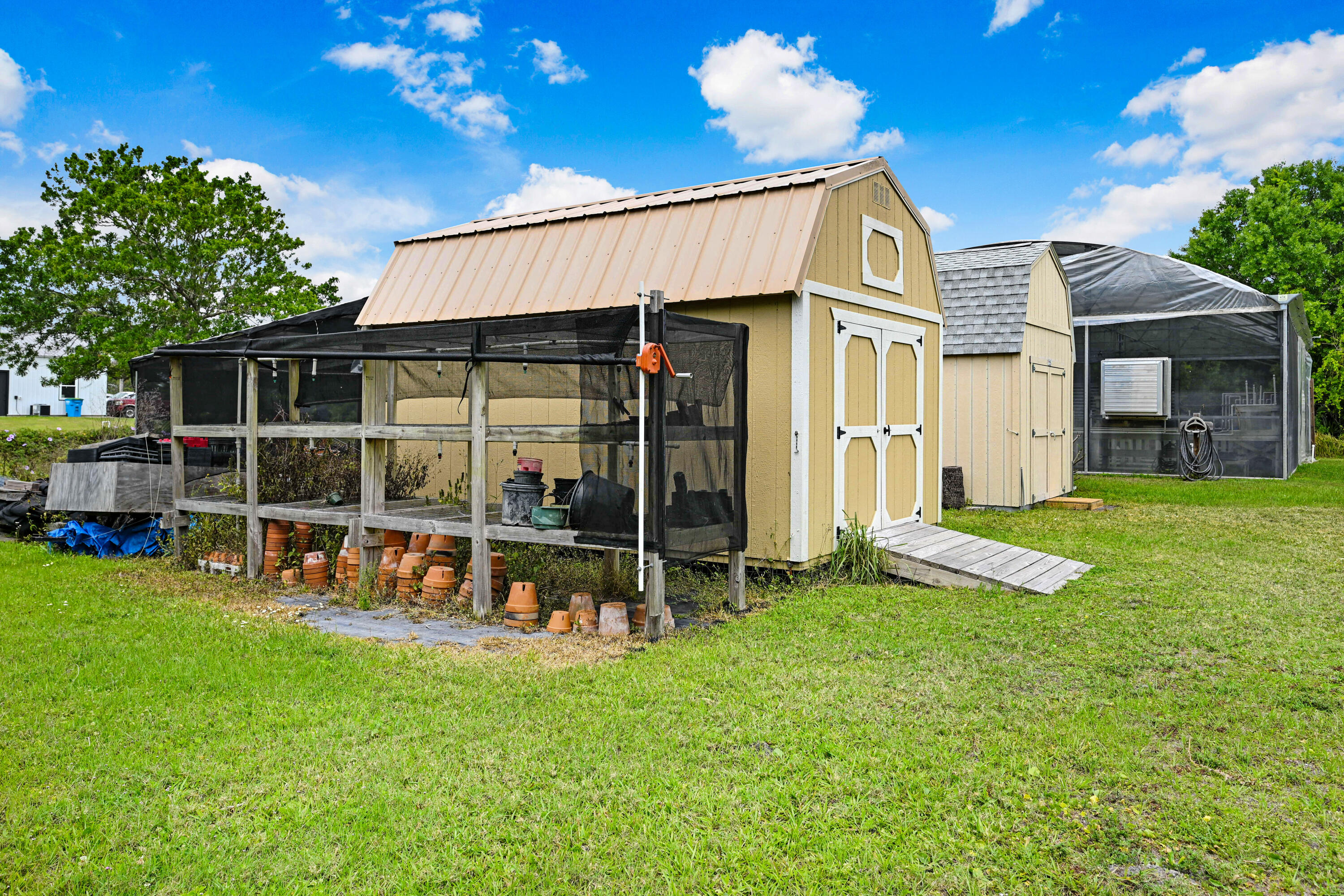 2690 Weber Road Malabar, FL 32950 - Photo 59 of 60 a view of a house with a yard and sitting area