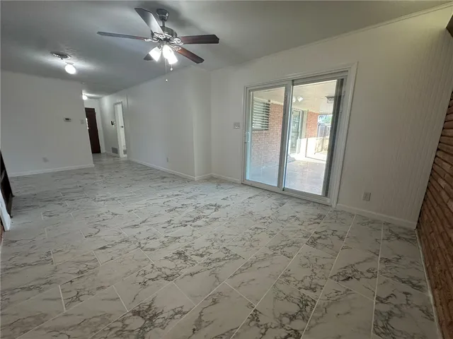 a view of a ceiling fan in a room