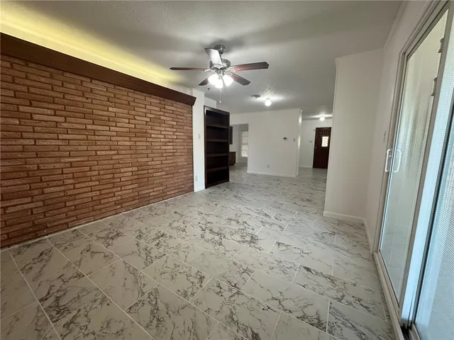 a view of a ceiling fan in a room