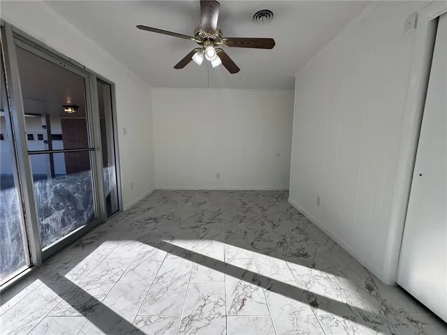 a view of a window in an empty room