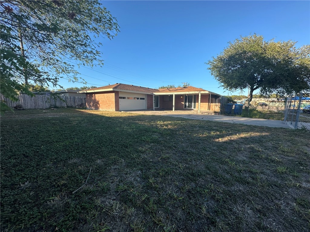 136 Daniel Moore Avenue Portland, TX 78374 - Photo 37 of 40 a front view of a house with a yard