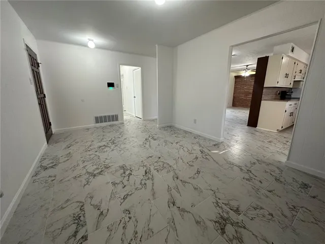 a view of a empty room with closet