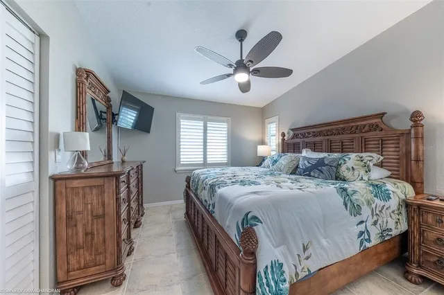a bathroom with a granite countertop sink vanity and mirror