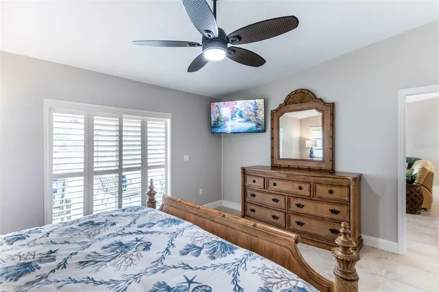 a bathroom with a tub a sink and a mirror