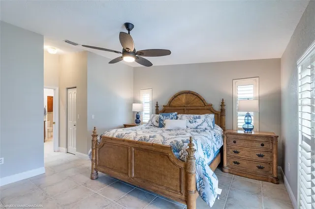 a bathroom with a shower and a sink