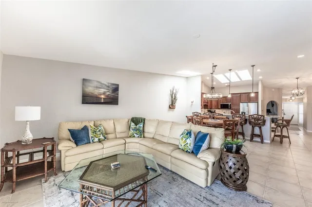 a view of a swimming pool with a table and chairs