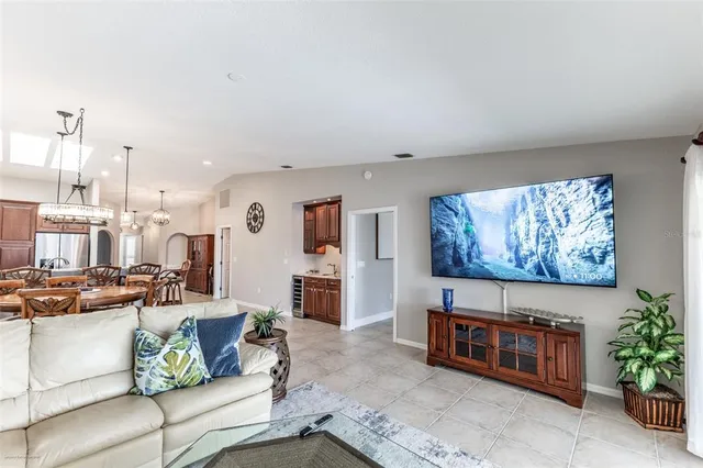 a view of a chairs and table on wooden deck