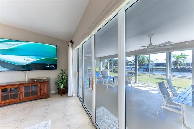 a view of a house with a yard and plants